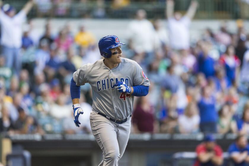 Chicago Cubs first baseman Anthony Rizzo hits a two-run home run off of Mike Fiers of the Milwaukee Brewers during a game on Sept. 28, 2014.