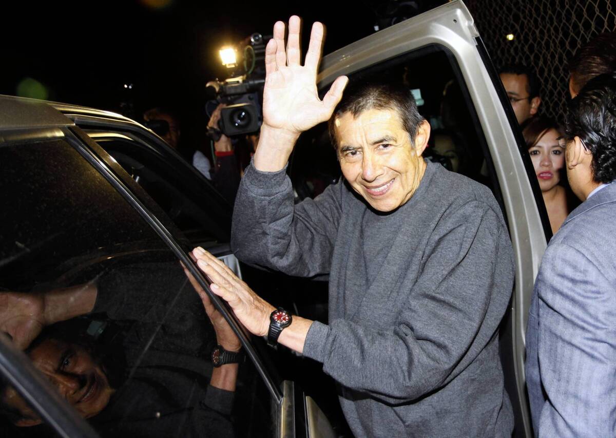 Gen. Tomas Angeles Dauahare waves after his release from Altiplano maximum-security prison last week in Mexico.