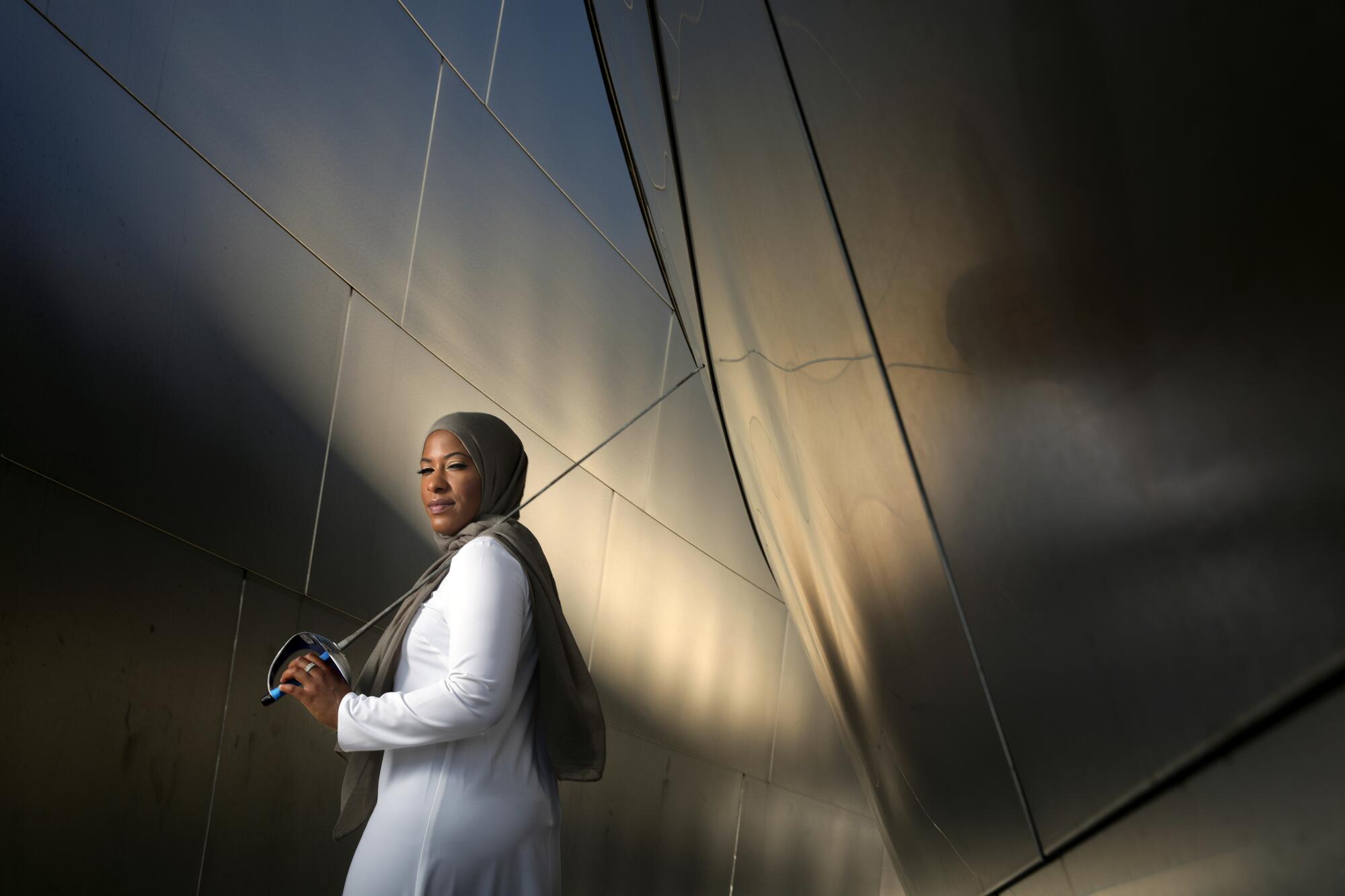 Ibtihaj Muhammad, photographed at Walt Disney Concert Hall in downtown Los Angeles, is the first Muslim American athlete to wear a hijab at the Olympic Games.