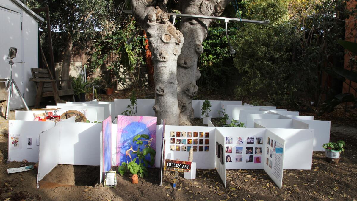 For the inaugural "Art Basil," artist John Kilduff set up some 50 miniature booths as well as various basil plants in his backyard. The booths feature pieces and installations by artists from all over the U.S. and beyond. The show runs through Sunday.