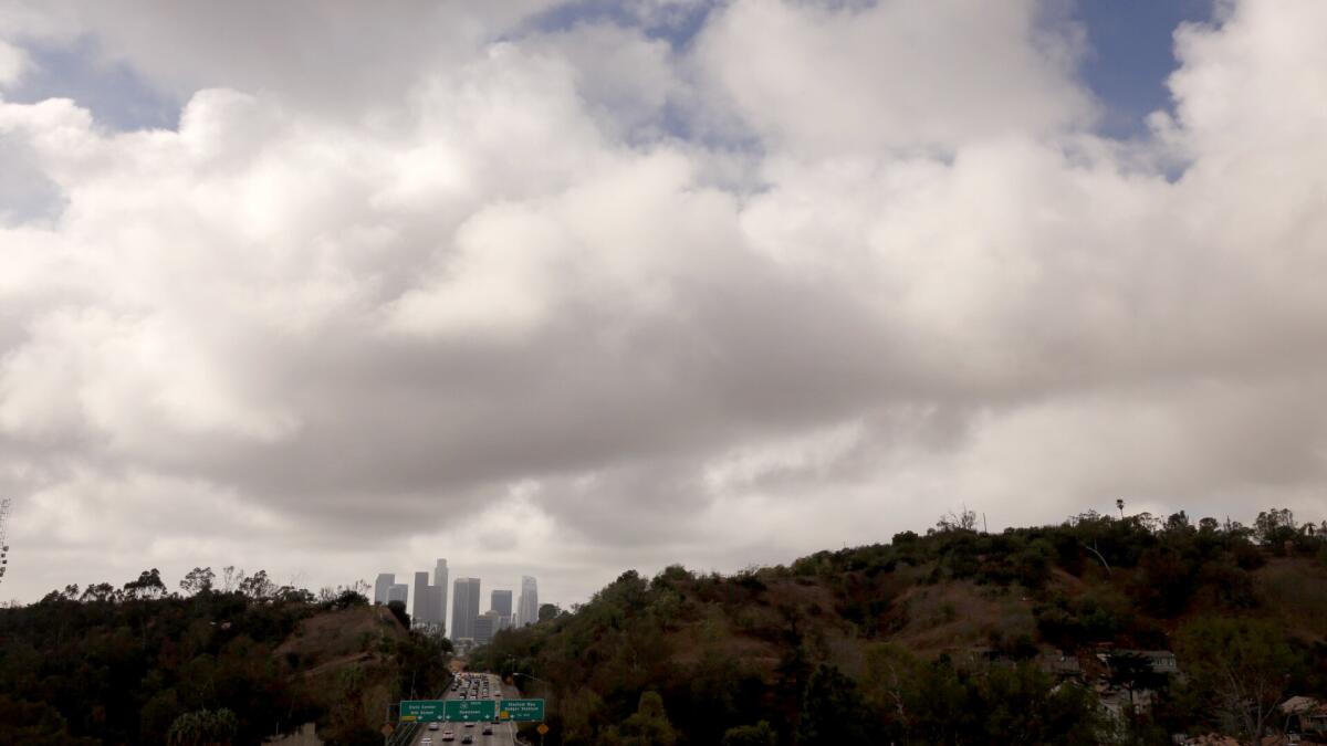 Clouds hover over downtown Los Angeles on Oct. 17, 2016.