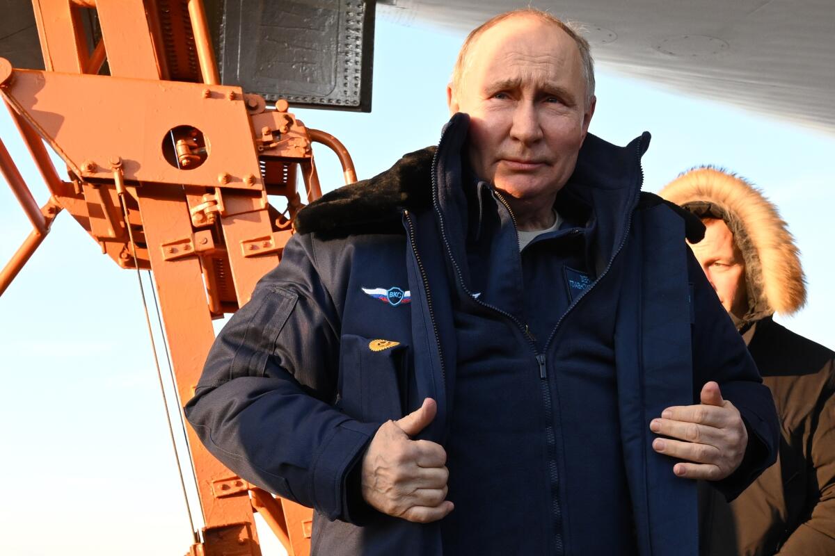 Russian President Vladimir Putin wearing a flight suit