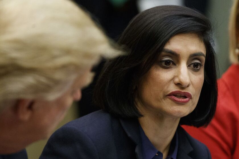 FILE - In this March 22, 2017, file photo President Donald Trump , left, and Texas State Sen. Dawn Buckingham, right, listen as Administrator of the Centers for Medicare and Medicaid Services Seema Verma speaks during a meeting on women in healthcare in the Roosevelt Room of the White House in Washington. Verma is slamming âMedicare for All,â the proposal from Vermont Democratic Sen. Bernie Sanders for a national health care plan that would cover all Americans. (AP Photo/Evan Vucci, File)