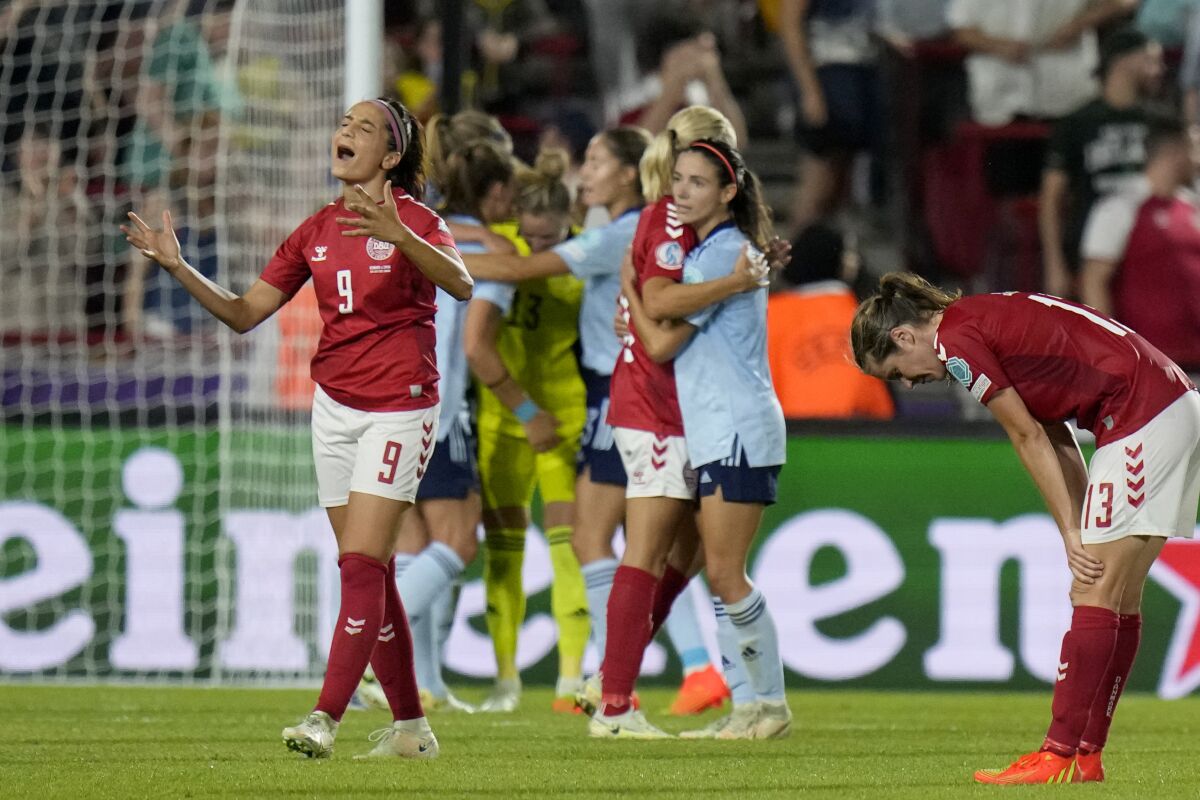 Denmark's Nadia Nadim, left, reacts at the end of a loss to Spain at Women's Euro 2022 in July.