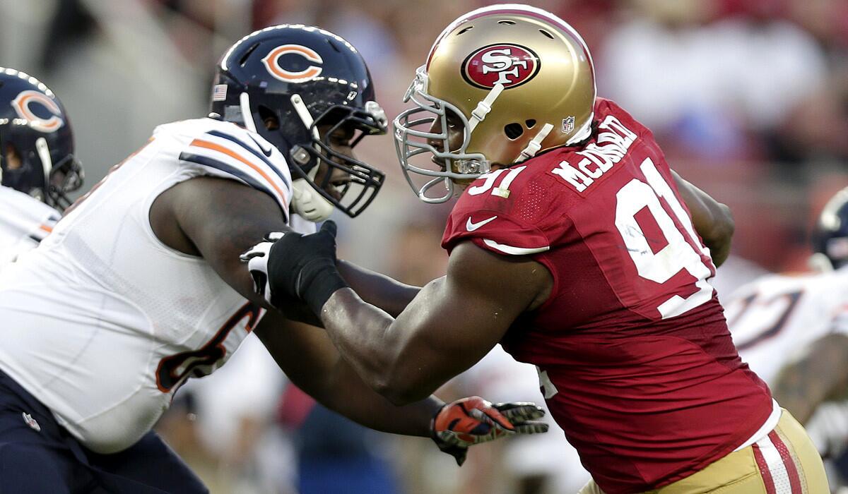 49ers defensive tackle Ray McDonald tries to get past the block of Bears offensive tackle Jordan Mills during the second quarter of their game Sunday.