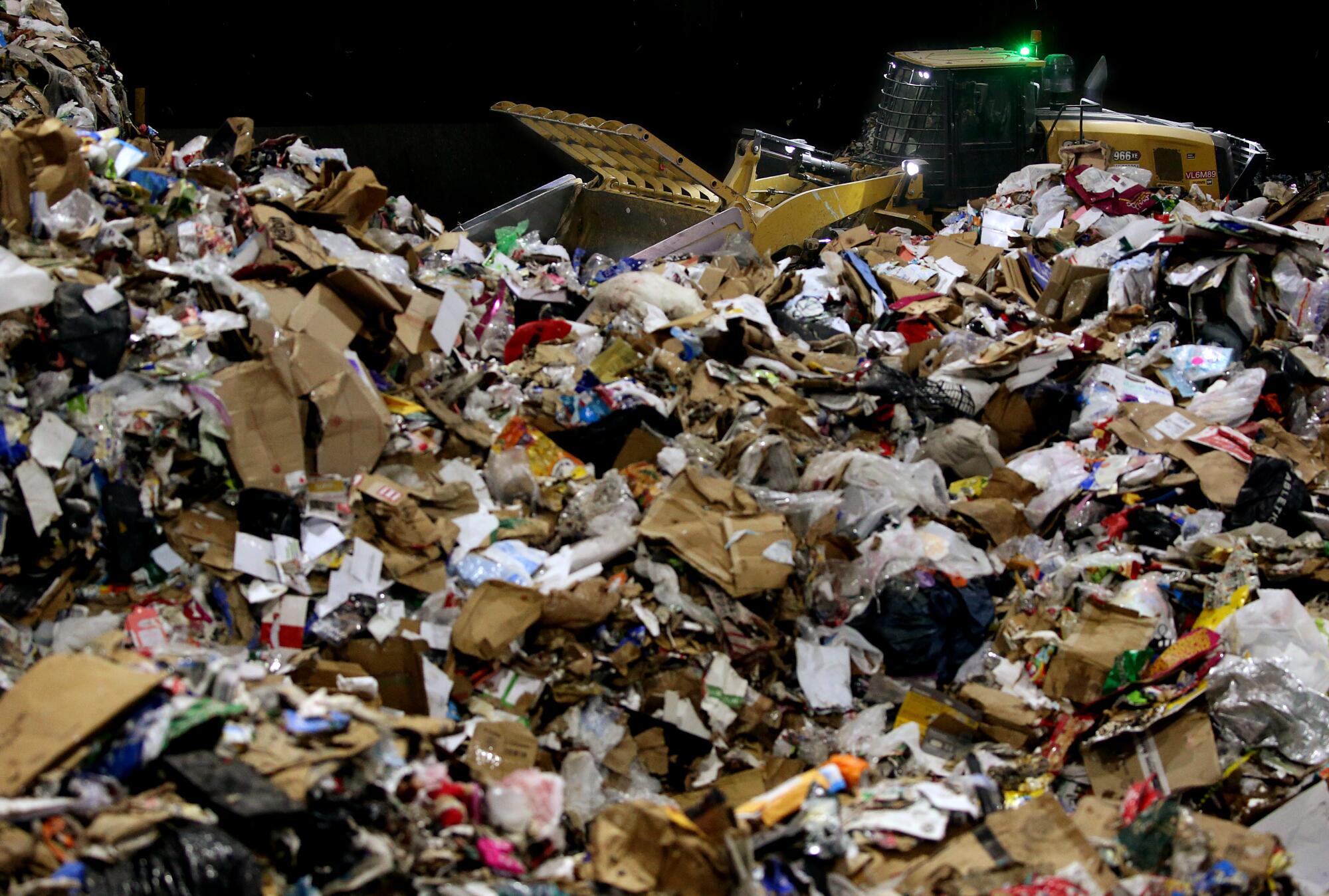 Recyclables in a pile at a sorting facility.