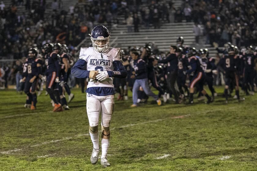 Anaheim, CA - November 18: Newport Harbor's Kashton Henjum walks off the field after the Sailors lost to Cypress in a CIF Southern Section Division 4 football semifinal game at Western High School on Friday, Nov. 18. (Scott Smeltzer / Daily Pilot)