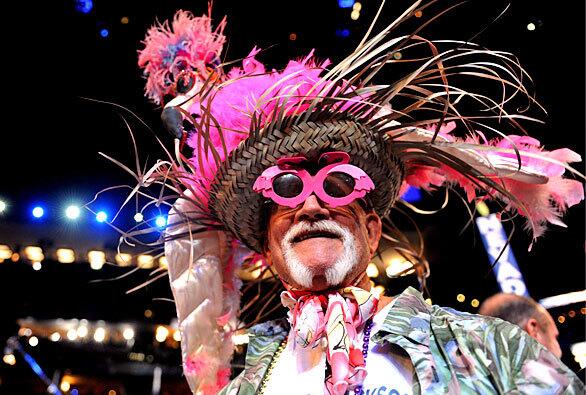 Florida delegate Jim Jackson of St. Petersburg wears a flamingo and feather hat at the Democratic National Convention in Denver.