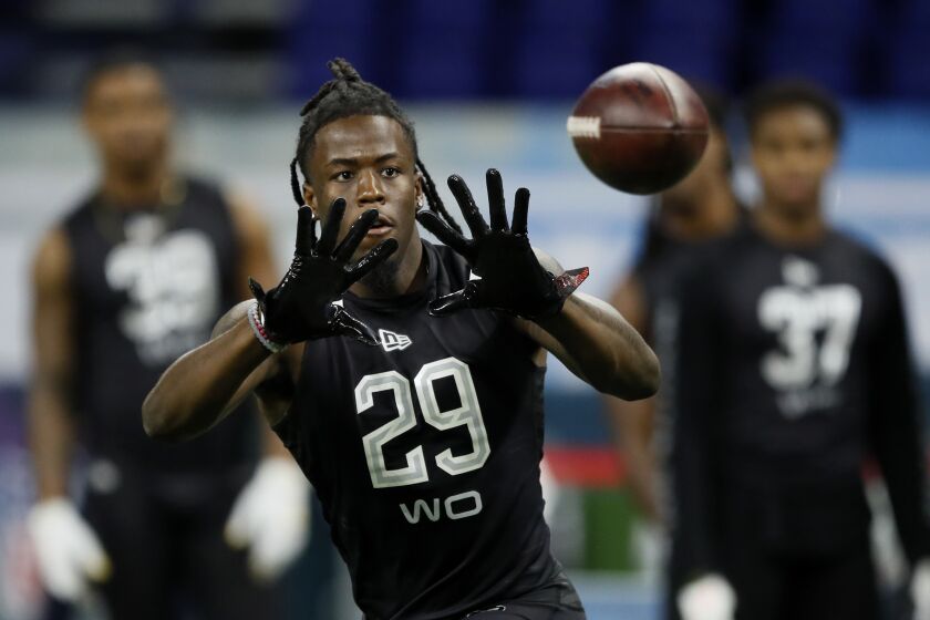 Alabama wide receiver Jerry Jeudy runs a drill at the NFL football scouting combine in Indianapolis, Thursday, Feb. 27, 2020. (AP Photo/Charlie Neibergall)