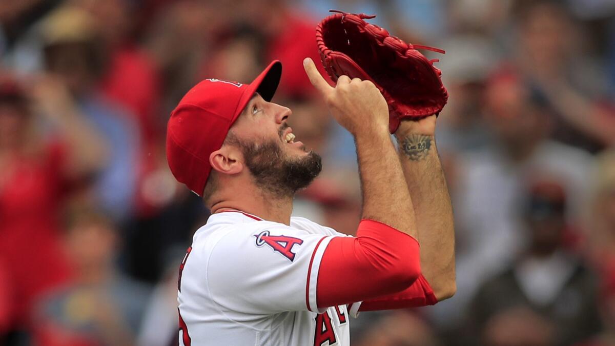 Angels relief pitcher Blake Parker celebrates a win against the Tampa Bay Rays.