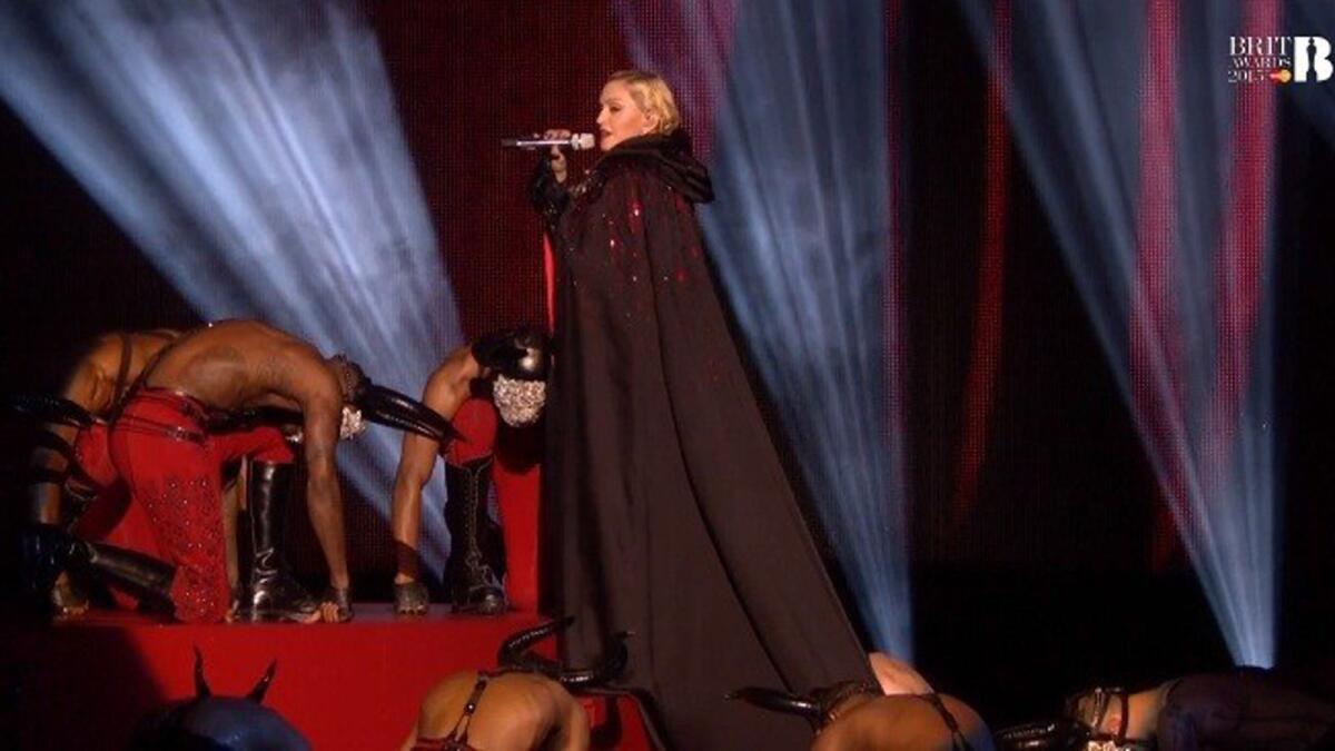 Madonna is shown, just before taking a tumble during the Brit Awards on Wednesday.
