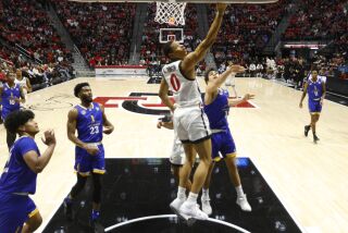 San Diego, CA - January 28: San Diego State's Keshad Johnson scores on a reverse against San Jose State on Saturday, January 28, 2023 in San Diego, CA. (K.C. Alfred / The San Diego Union-Tribune)