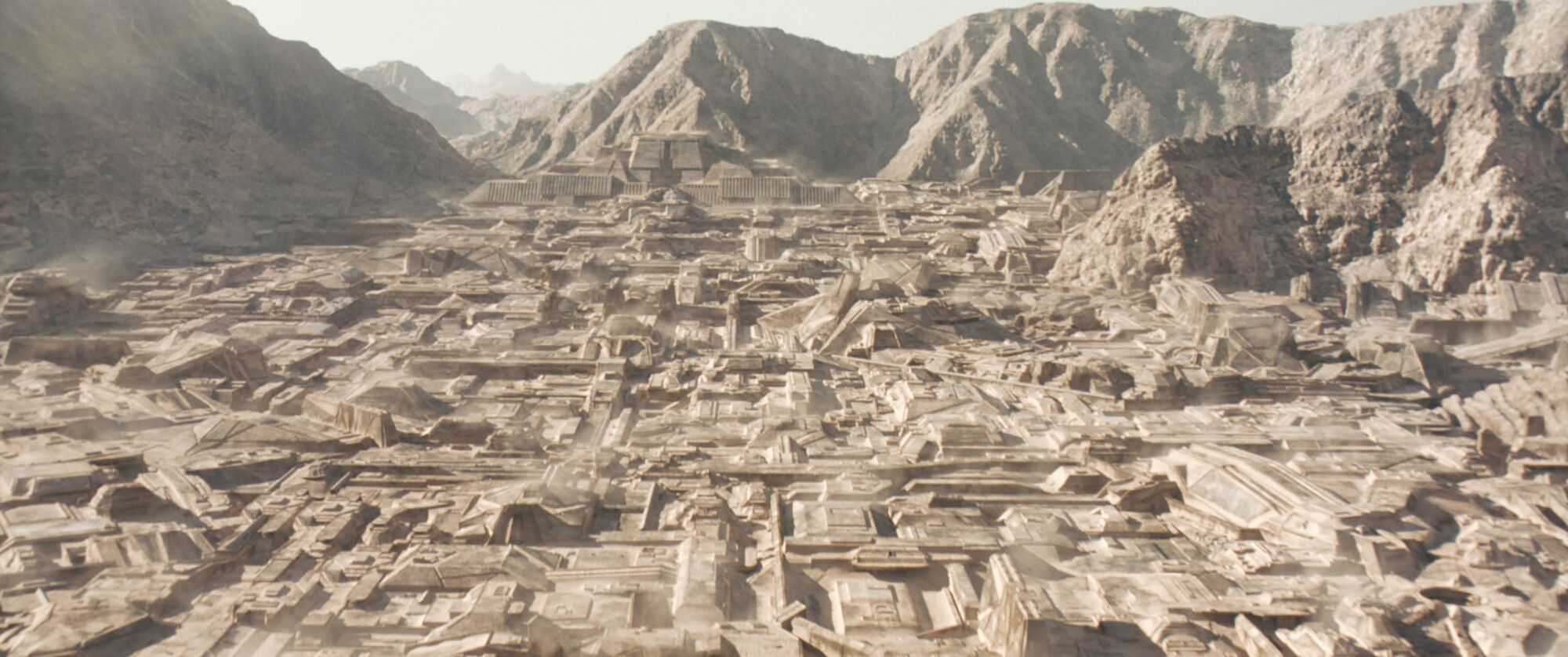 A wide overview of the dull grays and browns of the city of Arrakeen in "Dune."