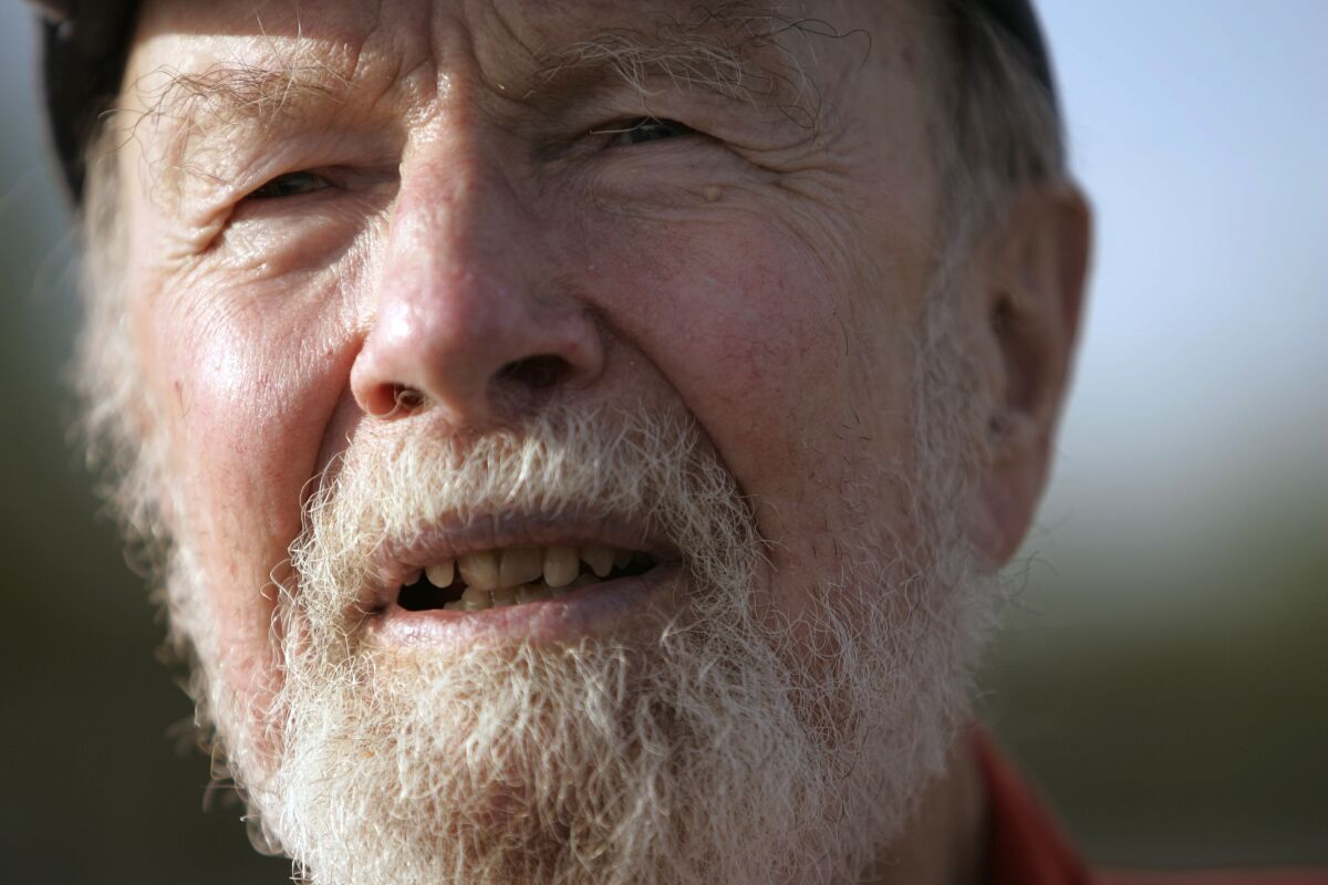 FILE - In this May 5, 2006, file photo, Pete Seeger talks during an interview in Beacon, N.Y. Seeger, the banjo-playing folk singer whose music was indelibly intertwined with his social activism, was honored Thursday, July 21, 2022 as the latest American musician to appear on a U.S. postage stamp. AP Photo/Frank Franklin II, File)