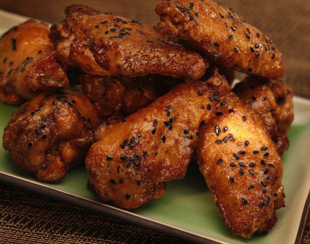 Your guests are going to have to remove the gloves for this one. Recipe: Thai peanut chicken wings