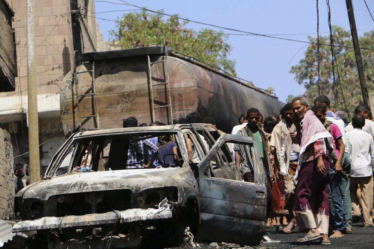 A neighborhood in Taizz, Yemen, suffered damage in fighting between Houthi rebels and forces loyal to President Abdu Rabu Mansour Hadi.