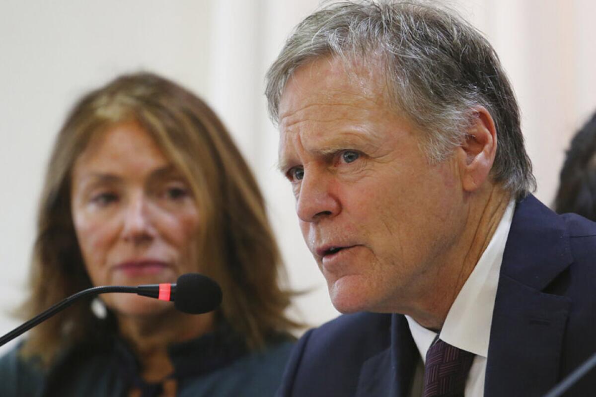 Fred and Cindy Warmbier, the parents of former hostage Otto Warmbier, take part in a news conference in Seoul on Friday.