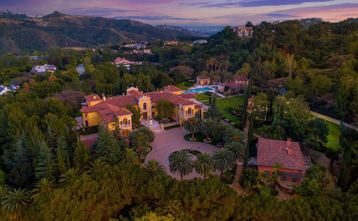 The 10-acre compound includes an Italian-inspired mega-mansion, guesthouse, pool house and multiple sports fields.