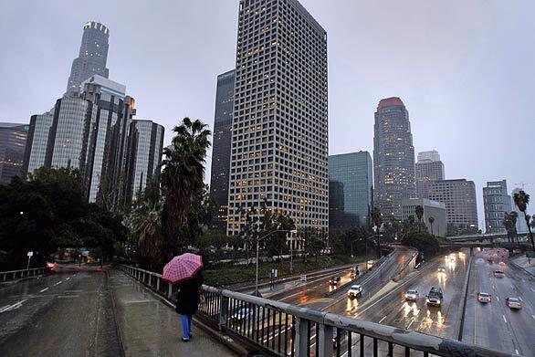 Thanks to the Presidents Day holiday, the 110 Freeway was not snarled by rain, as it often is during commuting hours under the 4th Street bridge in downtown Los Angeles.