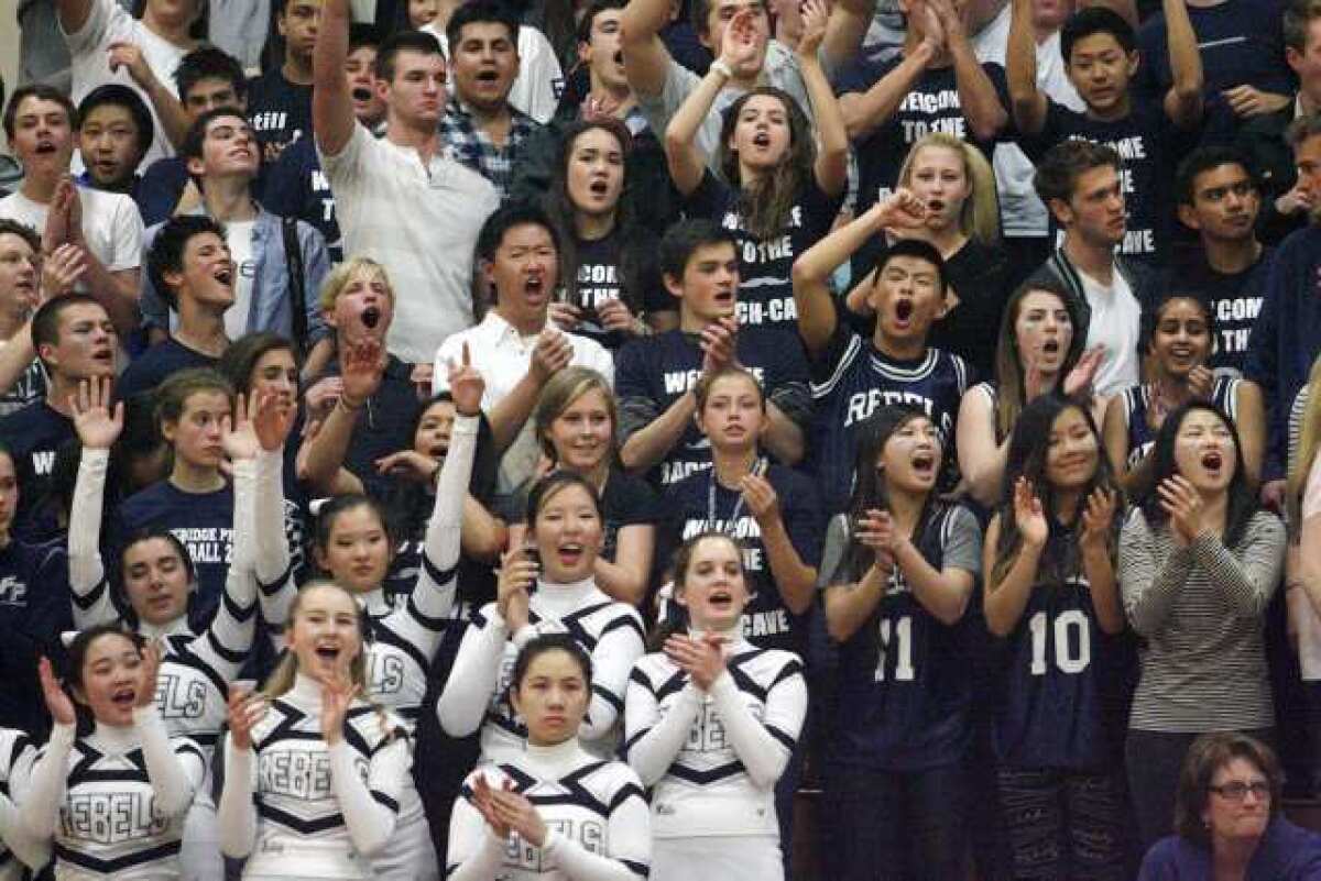 Flintridge Prep fans cheer on their team during a game at Pasadena Poly on Saturday.