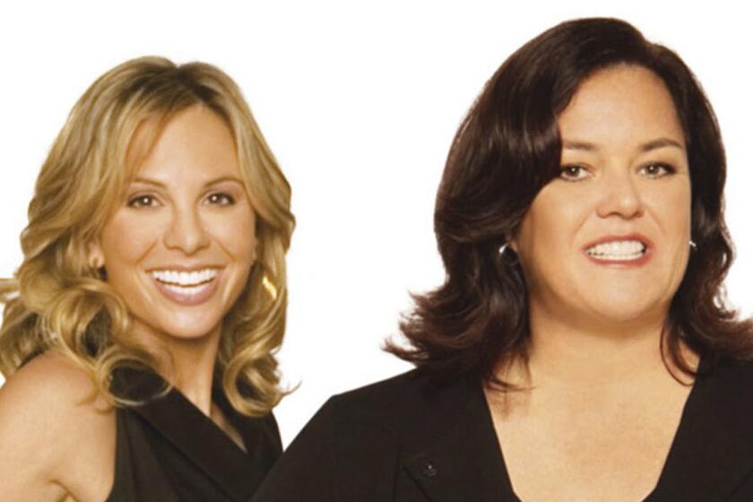 **FILE** This 2006 file photo, originally provided by ABC, shows Elisabeth Hasselbeck, left, and fellow co-host of ABC's morning talk show "The View," Rosie O'Donnell in New York. The pair squabbled on the show Wednesday, May 23, 2007, and the two co-hosts traded accusations and personal digs. (AP Photo/ABC, Yolanda Perez) ORG XMIT: NYET100