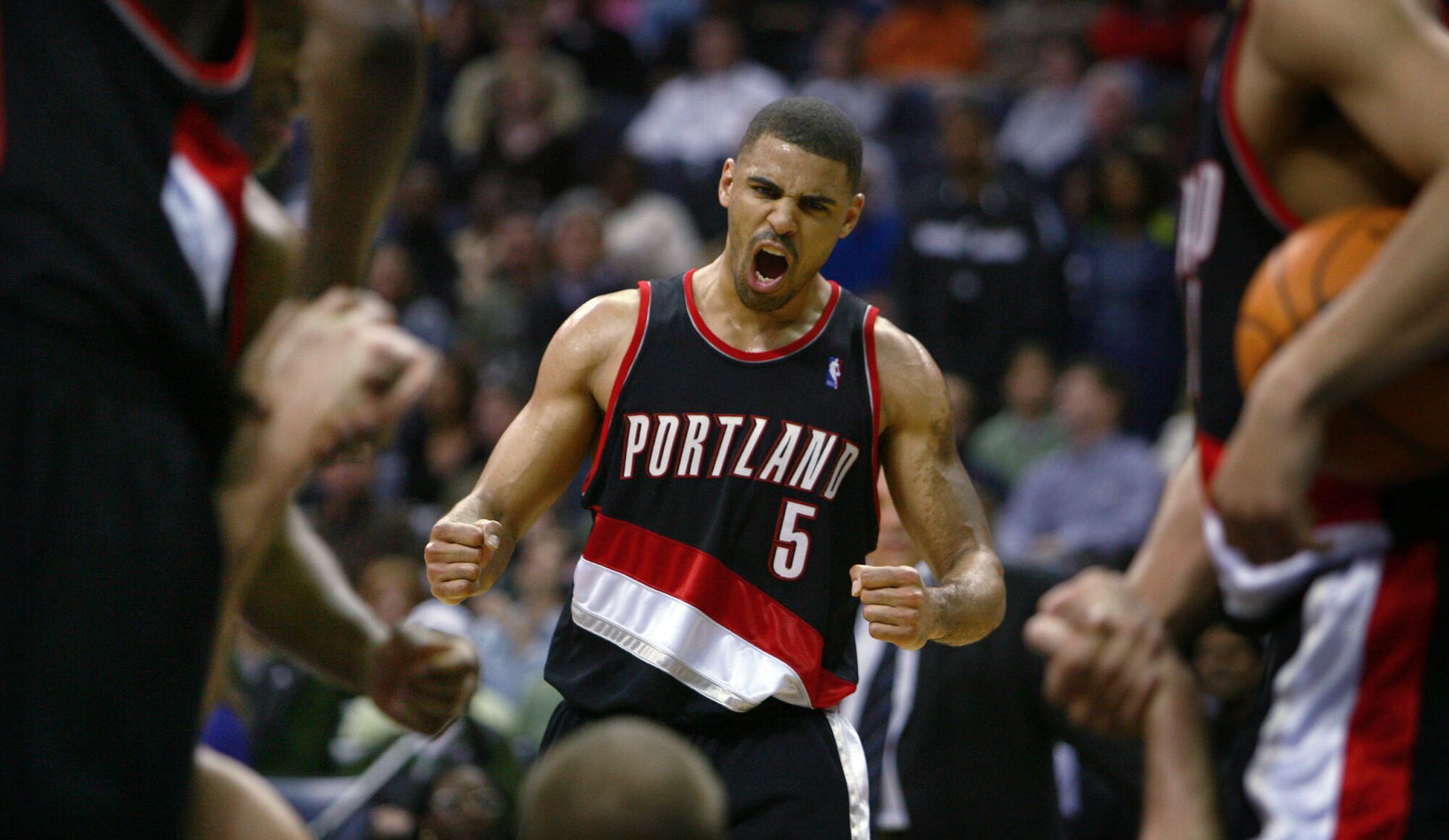 Ime Udoka (5) celebrates after the Trail Blazers scored in the second overtime against the Grizzlies on Jan. 27, 2007.