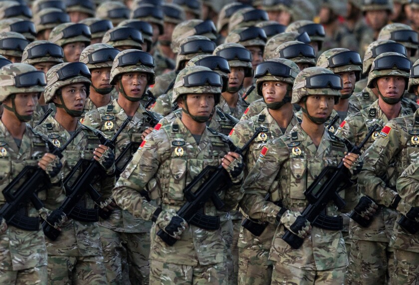 Chinese soldiers march past Tiananmen Square before a military parade in Beijing marking the 70th anniversary of the end of World War II.