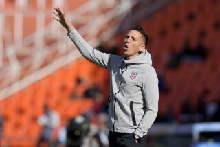 Coach Mikey Varas of the United States gestures during a FIFA U-20 World Cup round of 16 soccer match against New Zealand at the Malvinas Argentinas stadium in Mendoza, Argentina, Tuesday, May 30, 2023. (AP Photo/Natacha Pisarenko)