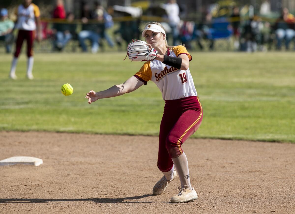 Ocean View's Sienna Erskine throws out Irvine's Annie Schwarzbart at first base on Thursday.