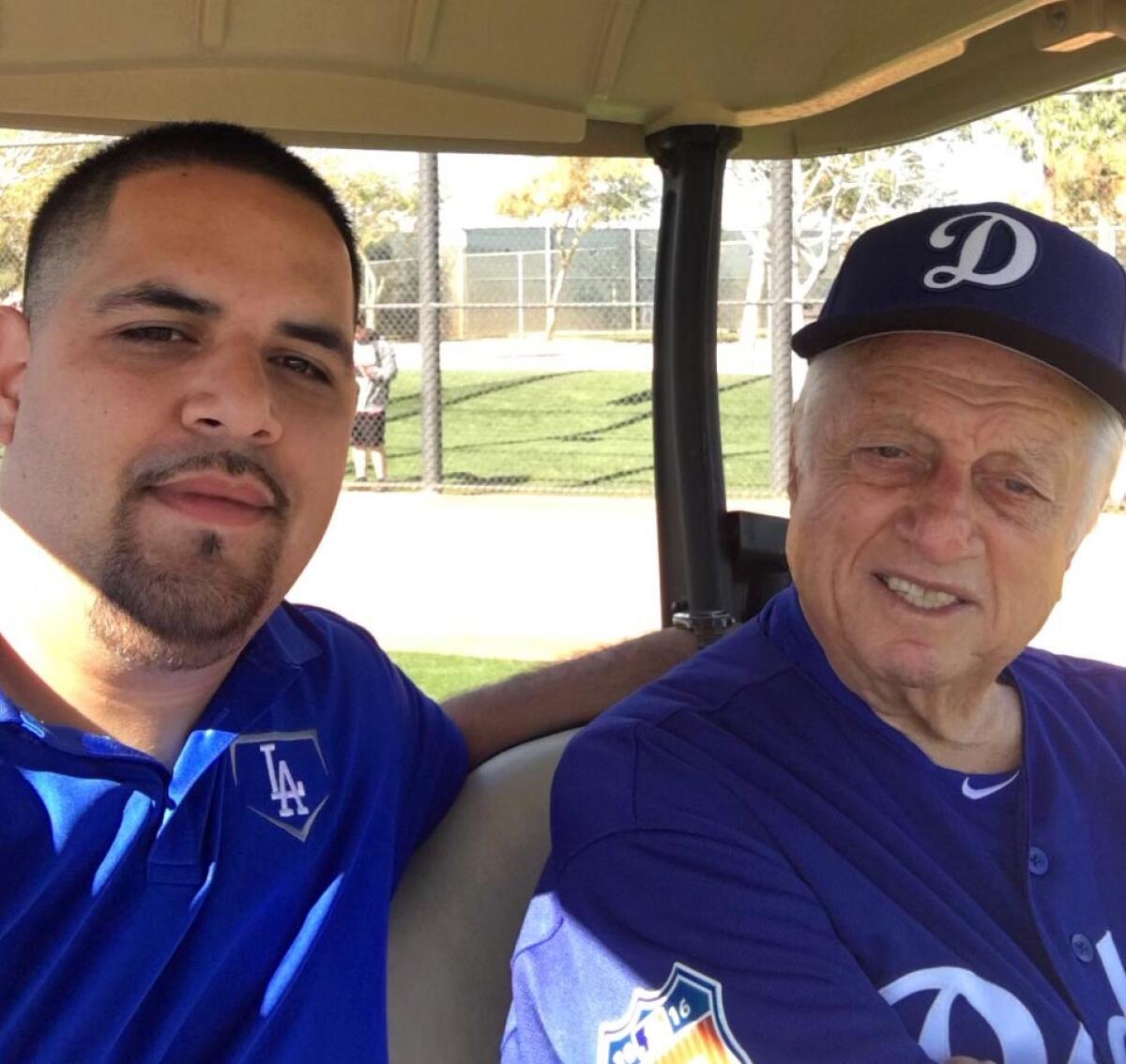 Dodgers legend Tommy Lasorda with his driver, Felipe Ruiz.