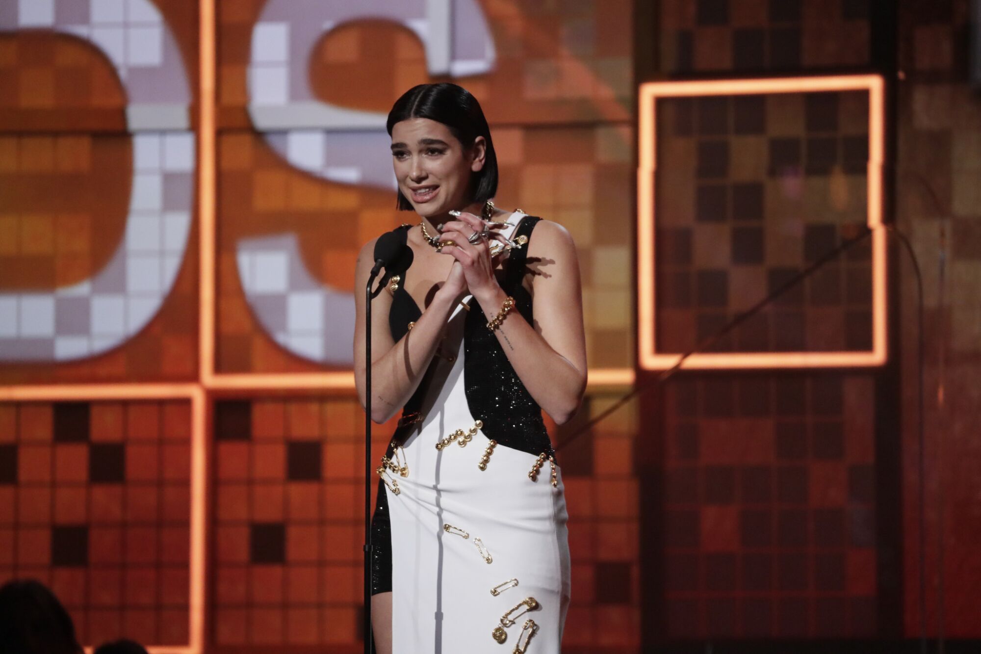 Dua Lipa at the mike accepting best new artist at the 61st Grammy Awards
