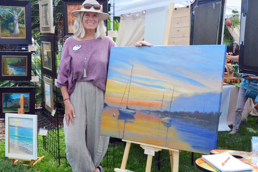 BJ Morrison McKay displays her oils and pastels during Art in the Park at Newport Beach Civic Center.