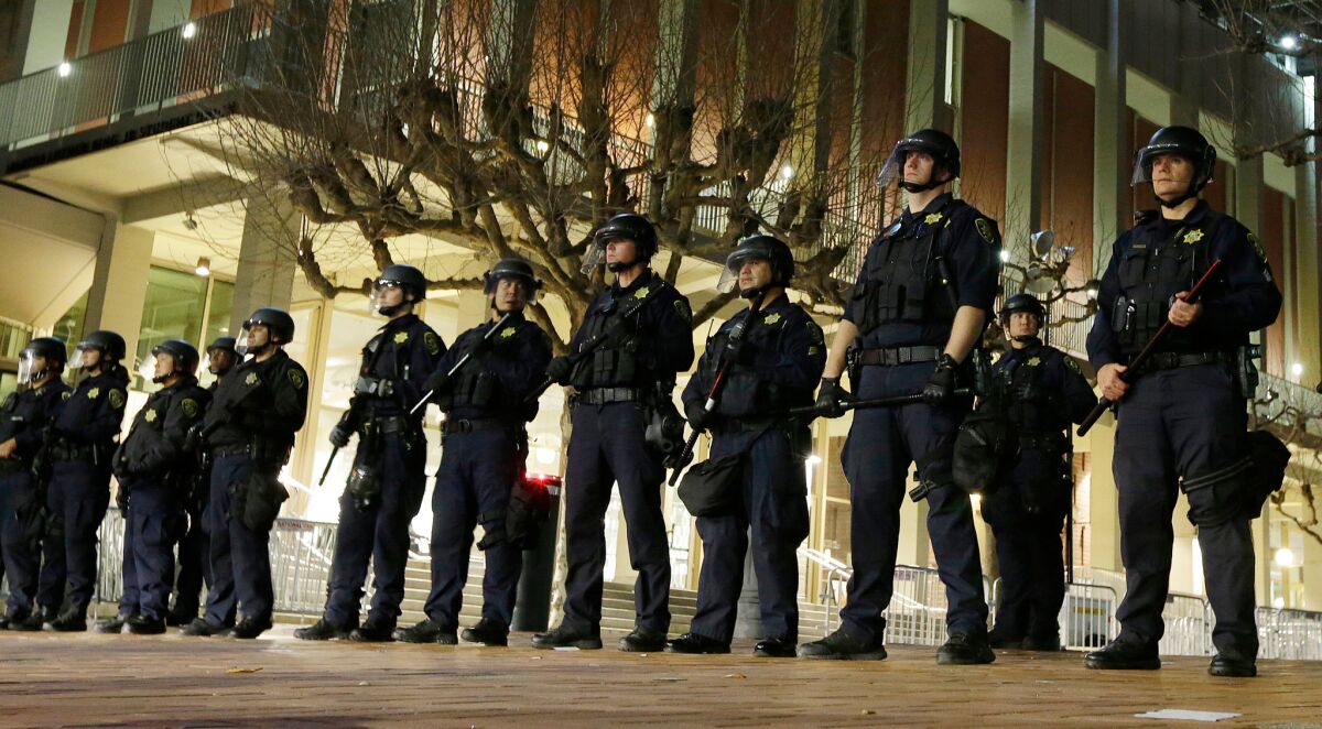 UC Berkeley police guard the building where right-wing provocateur Milo Yiannopoulos was to speak on Feb. 1, 2017.