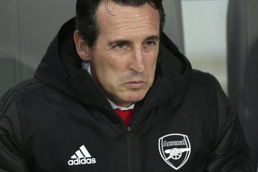 FILE - In this file photo dated Wednesday, Nov. 6, 2019, Arsenal's head coach Unai Emery during the Europa League soccer match against Vitoria at the D. Afonso Henriques stadium in Guimaraes, Portugal. Emery was fired by Arsenal on Friday, Nov. 29, 2019, 18 months after succeeding Arsene Wenger as manager of the English Premier League club. (AP Photo/Luis Vieira, FILE)
