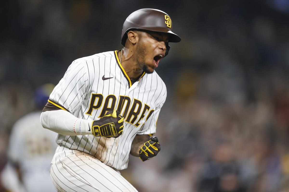 The Padres' Jose Azocar celebrates after hitting a walk-off single to defeat the Milwaukee Brewers last month.