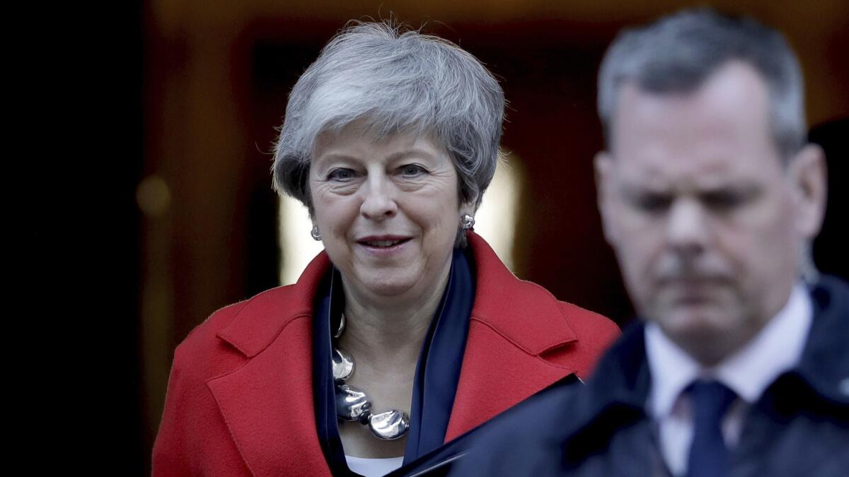British Prime Minister Theresa May leaves 10 Downing St. to make a statement to Parliament in London on Feb. 26, 2019.