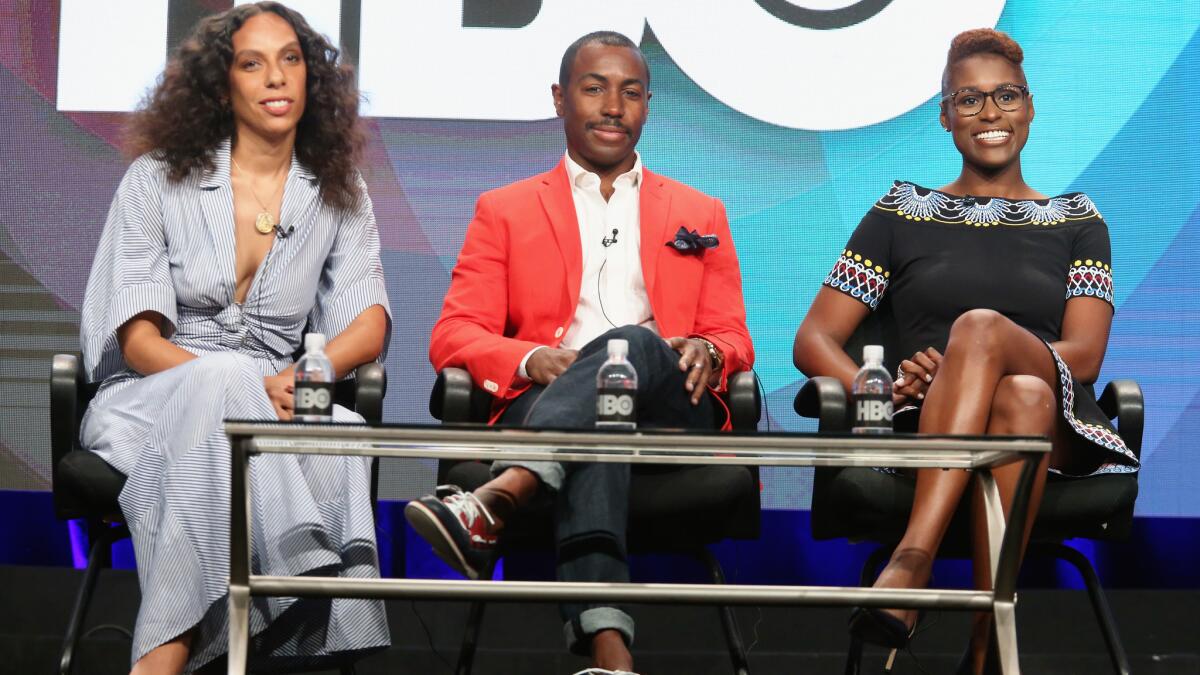 Executive producer/director Melina Matsoukas, executive producer Prentice Penny and actress/executive producer/creator Issa Rae speak onstage during the "Insecure" panel discussion.