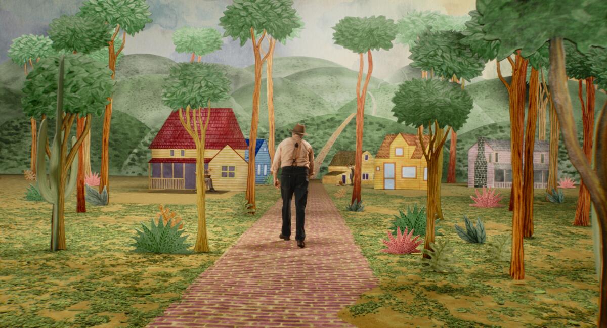 A man walks through an animated village.