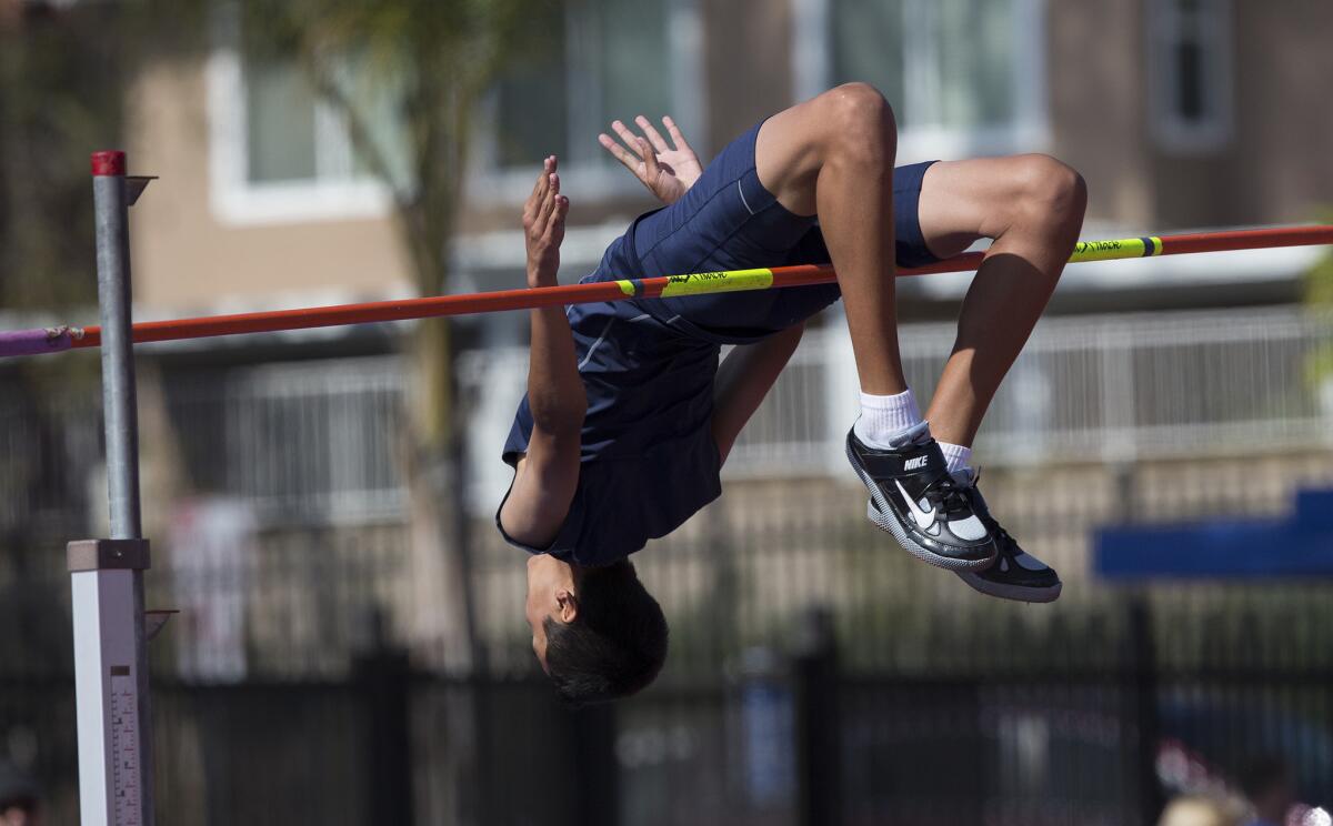 Trabuco Hills freshman high-jumper Sean Lee competes during an event at El Toro High School on April 1.