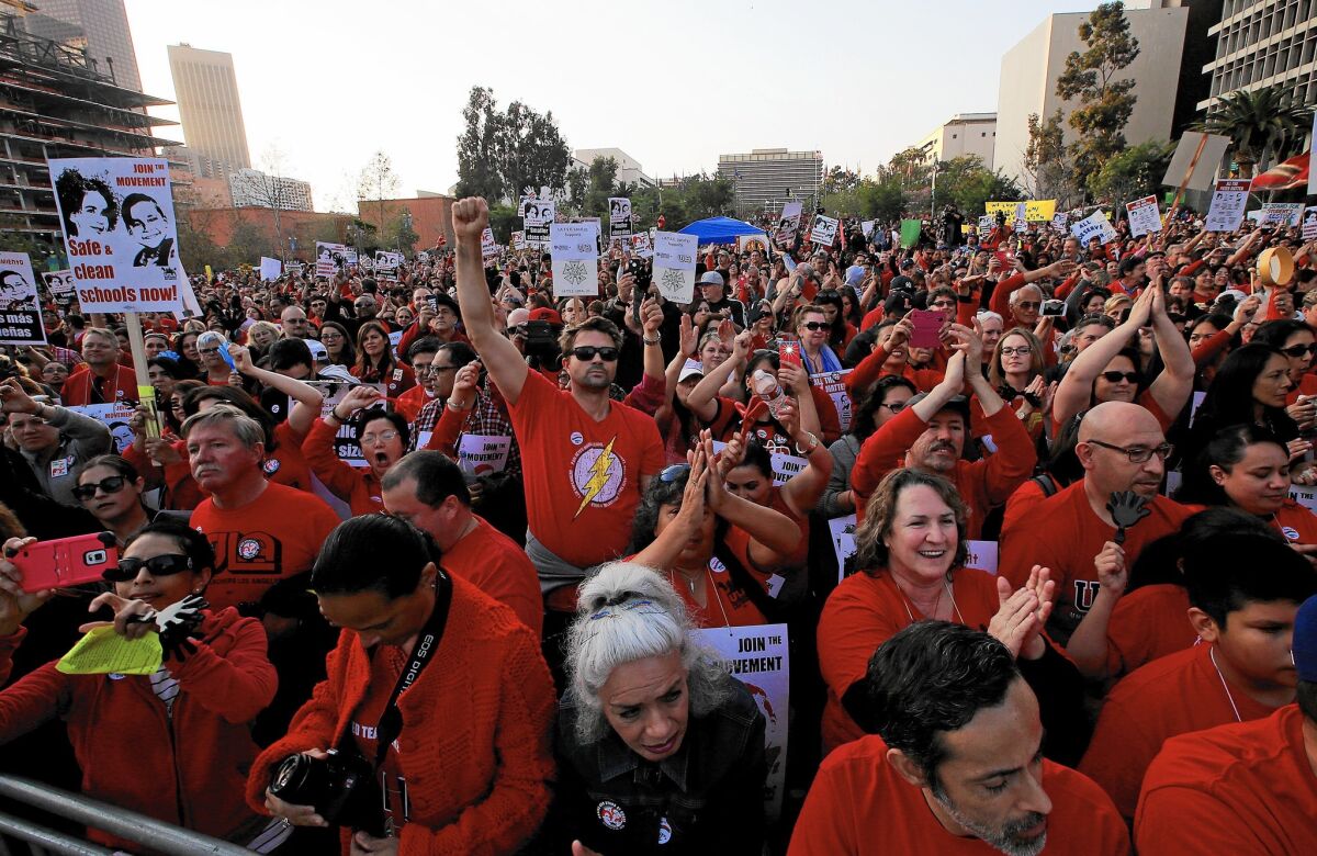 Members of United Teachers Los Angeles press their contract demands at a recent rally in downtown's Grand Park.