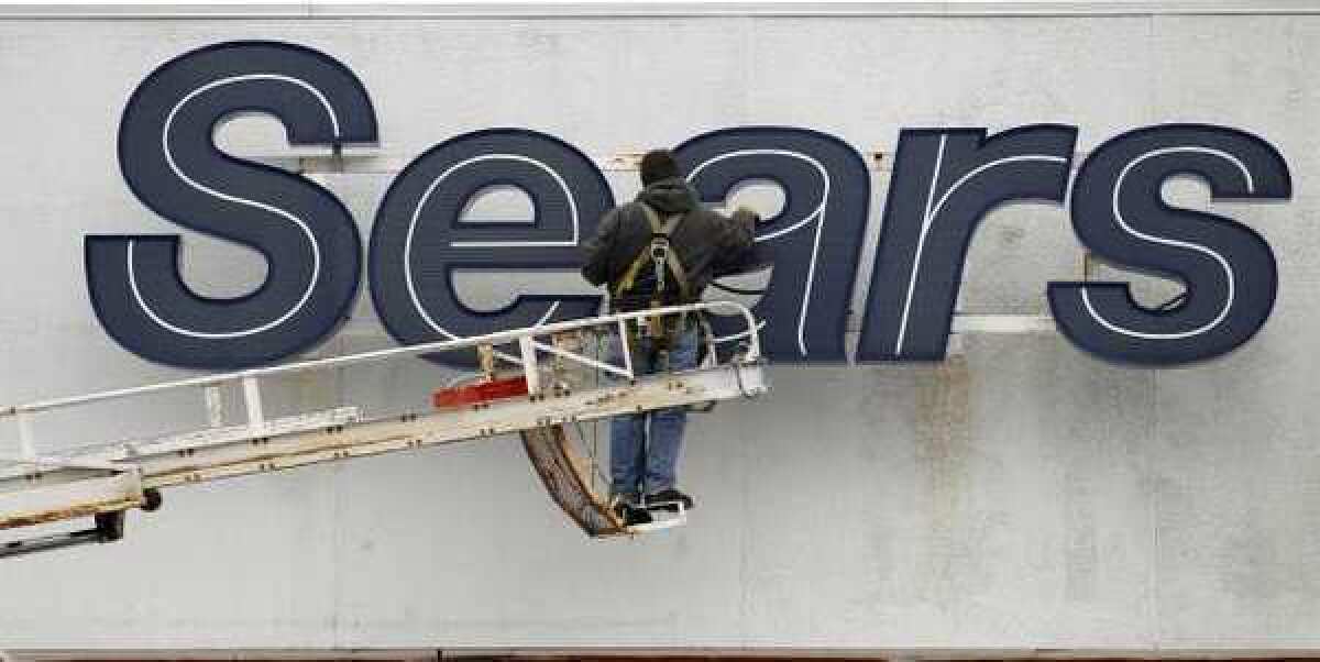 Sears Holdings said it will move ahead with plans to split off its Hometown and Outlet stores.
