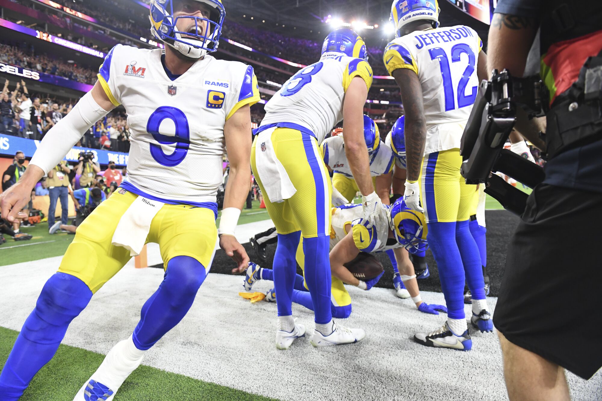 Rams quarterback Matthew Stafford celebrates after throwing a touchdown pass that was overturned.