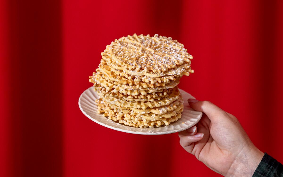 A stack of thin and crispy Italian pizzelle cookies from Lupe and Cecilia Del Rivo.