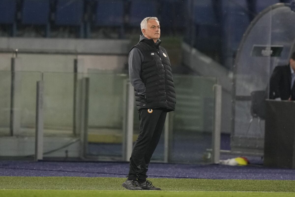 Roma's head coach Jose Mourinho stands during a Conference League semifinal second leg soccer match between Roma and Leicester City, at Rome's Olympic Stadium, Thursday, May 5, 2022. (AP Photo/Andrew Medichini)
