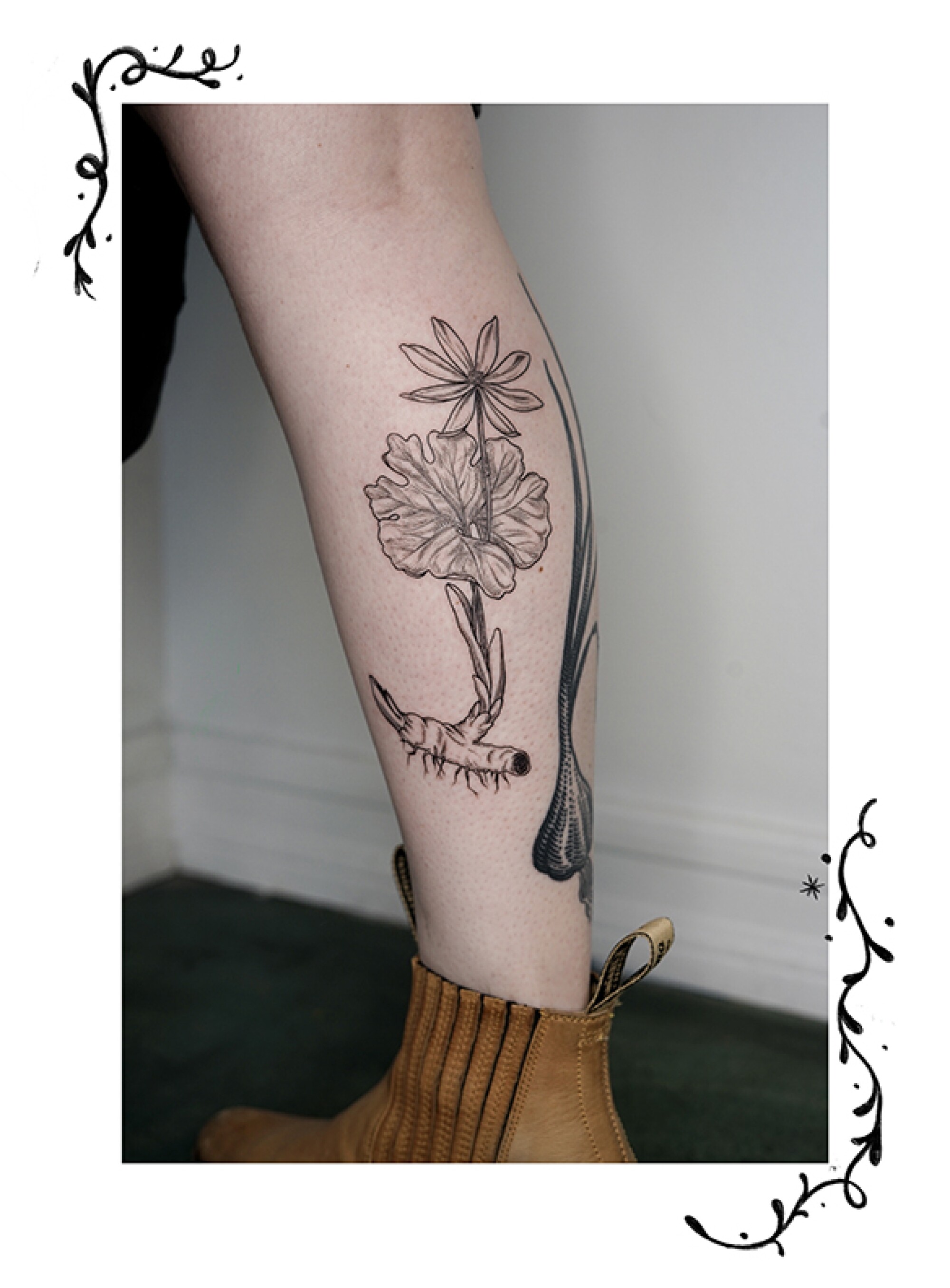 A wildflower tattoo on a leg. 