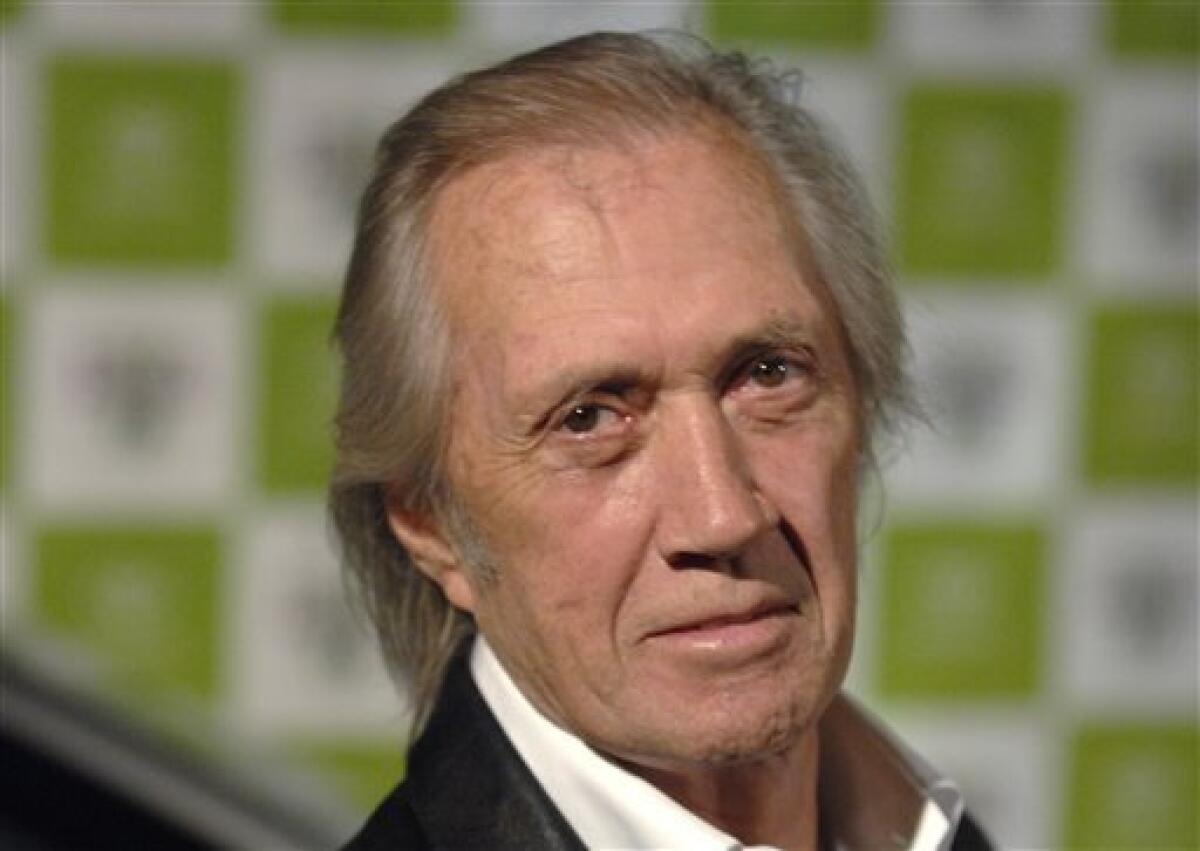FILE - In this Wednesday, Nov. 8, 2006 file photo, actor David Carradine arrives for the 16th annual Environmental Media Awards in Los Angeles. (AP Photo/Phil McCarten, file)