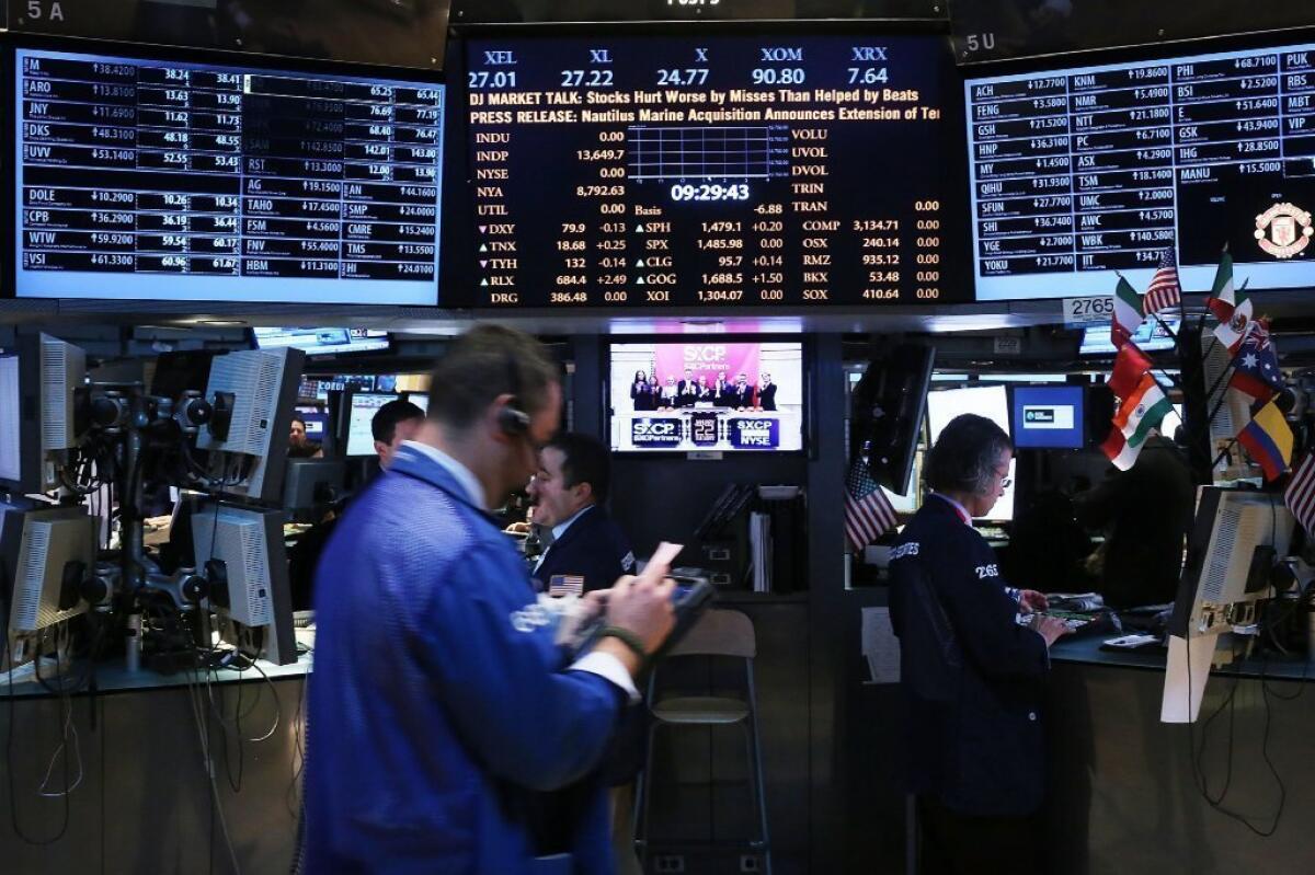 Traders on the floor of the New York Stock Exchange on Tuesday.