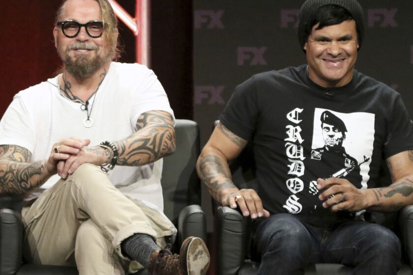 Kurt Sutter, co-creator/executive producer/writer, left, and Elgin James, co-creator/executive producer/writer/director, participate in the "Mayans M.C." panel during the FX Television Critics Association Summer Press Tour at The Beverly Hilton hotel on Friday, Aug. 3, 2018, in Beverly Hills, Calif. (Photo by Willy Sanjuan/Invision/AP)