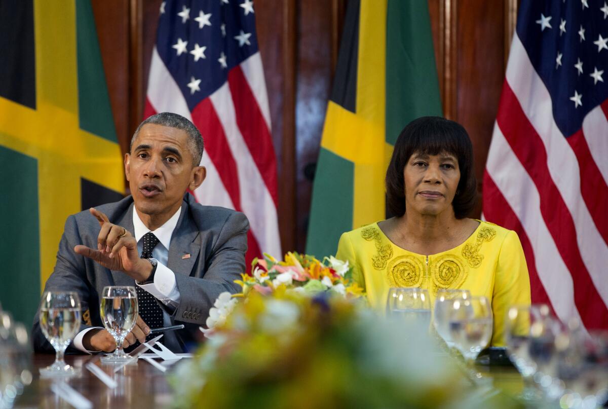 President Obama and Jamaican Prime Minister Portia Simpson-Miller meet Thursday in Kingston, Jamaica, where Obama said he soon will decide whether to remove Cuba from the U.S. list of state sponsors of terrorism.