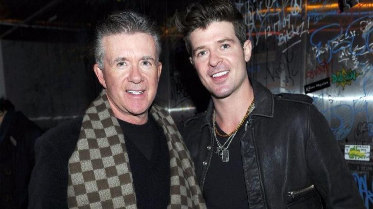 Alan Thicke and his son Robin Thicke in 2012.